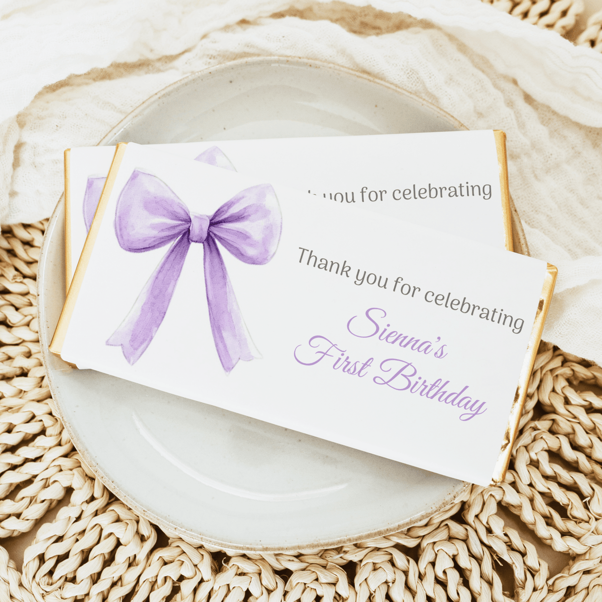 Lilac bow custom first birthday chocolate bar wrapper with name Sienna's and thank-you text