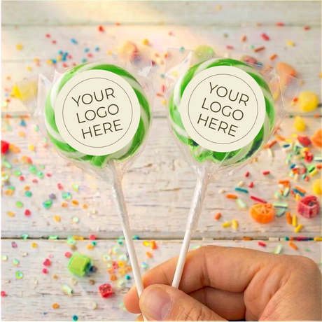 Green swirled lollipops with “Your Logo Here” labels on white sticks