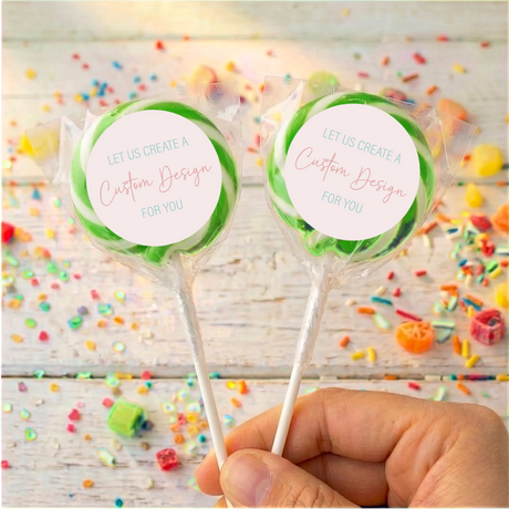 Personalized lollipop pair with green candy swirl, 'Custom Design' label on each stick