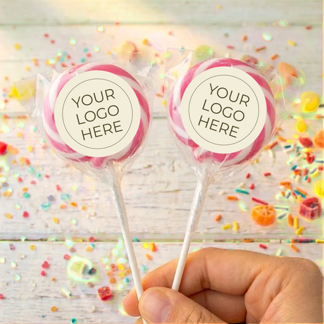 Pink swirled lollipops with “Your Logo Here” labels on white sticks