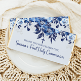 Chocolate bar wrappers with blue rose floral design, cross, and 'Thank you for celebrating'