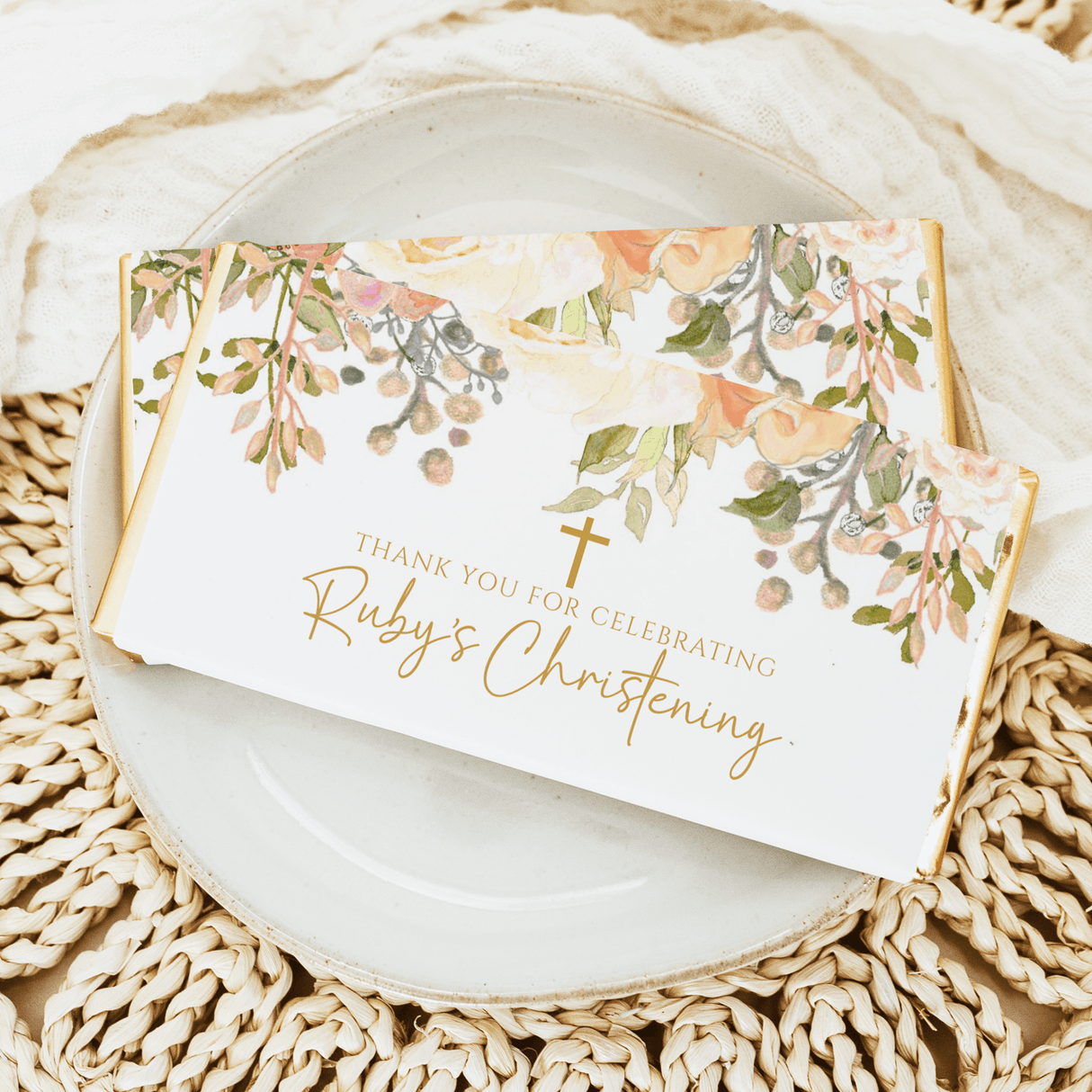 Christening chocolate bars with watercolor florals, cross, and 'Ruby's Christening' text