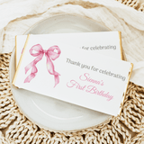 Pink bow first birthday chocolate bar wrapper, thank-you celebrating message