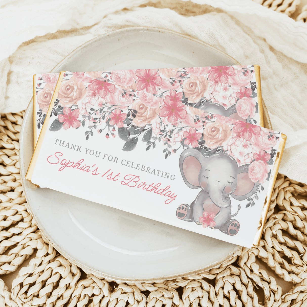 Chocolate bar wrapper with pink floral prints, gray elephant, and “Sophia’s 1st Birthday” text