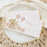 Pink birthday chocolate bar with teddy bear and balloons, 'Ruby is 2' label