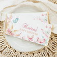 Personalised baby shower chocolate bars with butterfly design and “Hevias” text