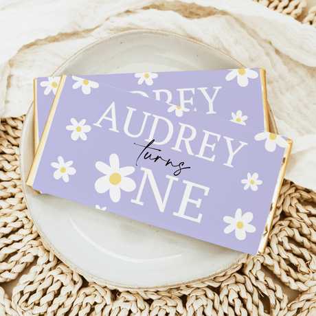 Purple daisy first birthday chocolate bar with 'Happy Audrey' text