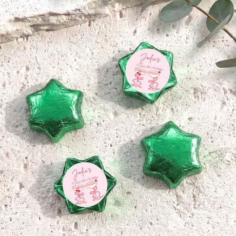 Green foil chocolate star-shaped candies with gift-style personalisation label