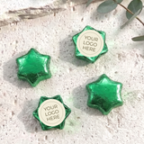 Green foil-covered chocolate stars with a round “YOUR LOGO HERE” imprint card