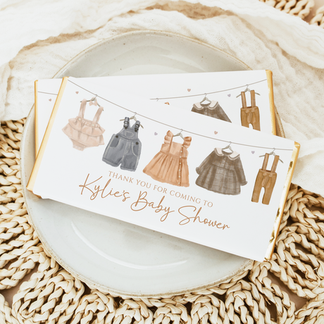 Baby shower thank-you cards with baby clothing illustrations and text