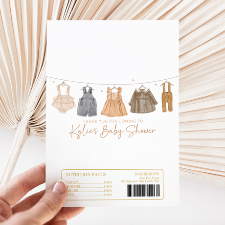 Printed chocolate wrapper with baby clothes icons, thank-you text and barcode