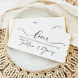 Wedding thank-you place card, black and white script on white background