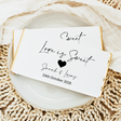 Wedding chocolate bar wrapper, white with black handwritten-style text and heart.