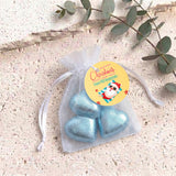 Blue metallic heart chocolates in sheer white organza gift bag with drawstring