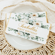 Sabella's First Birthday chocolate bar with white florals and green foliage label