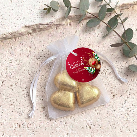 Personalised organza gift bag with gold heart chocolates and drawstring ribbon