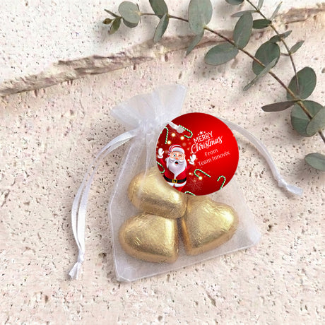 Gold organza Santa gift bag with drawstring and red Merry Christmas chocolate heart tag