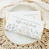 Wildflower wedding thank-you chocolate bar wrapper with floral border and custom names