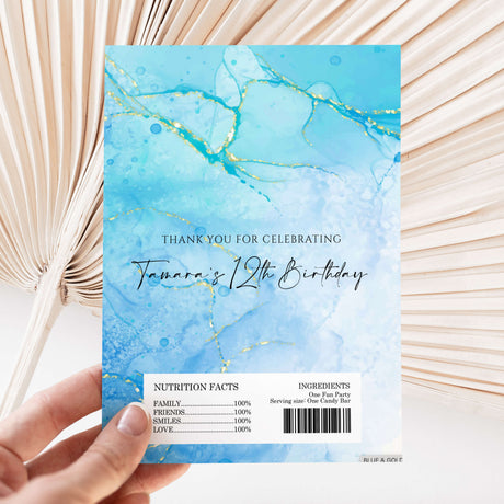 Birthday chocolate wrapper sheet with blue marble and gold accents, 'Thank you for celebrating'