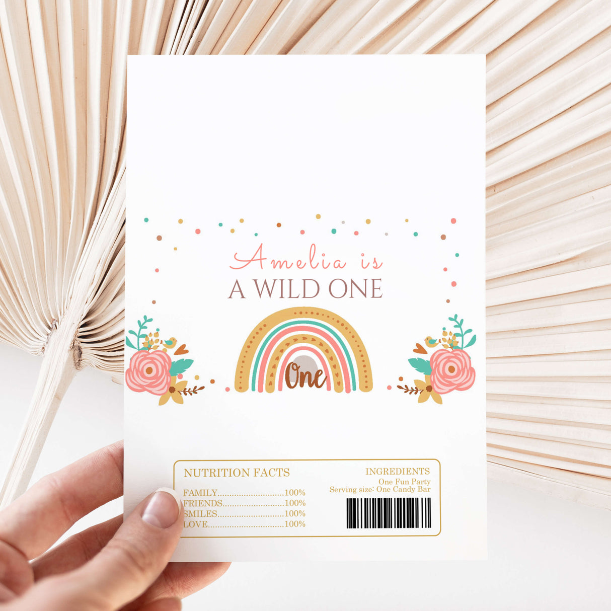 Wild One first birthday chocolate wrapper sheet with rainbow, flowers, and One label