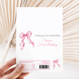 Pink ribbon bow first birthday printed chocolate wrapper with Sienna’s thank-you text