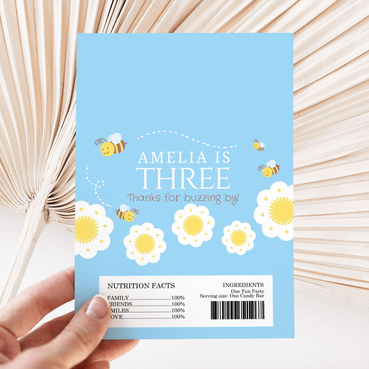 Blue DIY birthday chocolate wrapper with bee print, name text and flowers