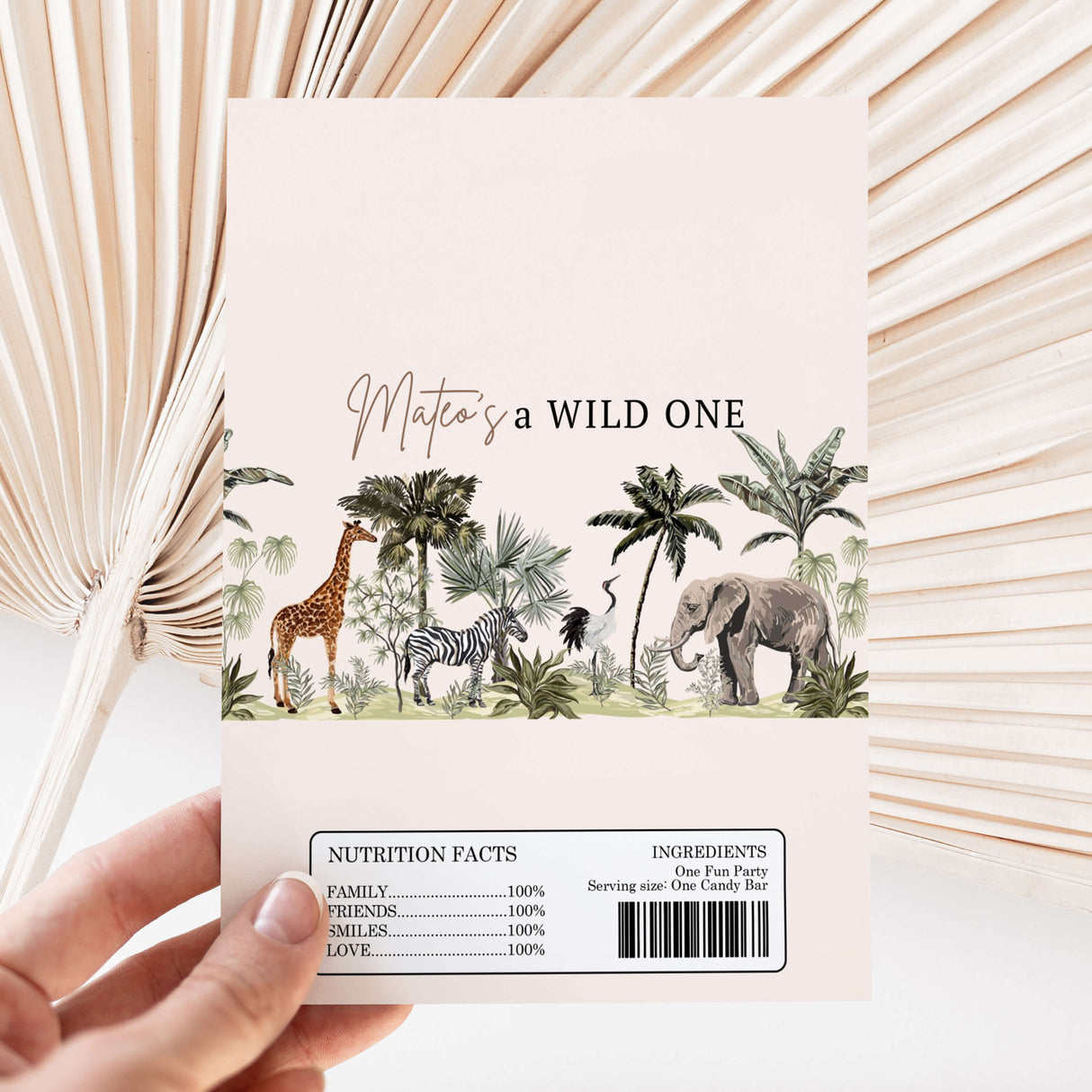 Jungle-themed chocolate wrapper with 'Mateo's a WILD ONE' animal print and nutrition panel