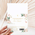 Christening chocolate wrapper sheet with floral pink greenery, gold cross, and thank-you text