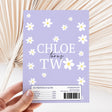 Purple daisy printed custom chocolate bar wrapper with CHLOE turns TW text