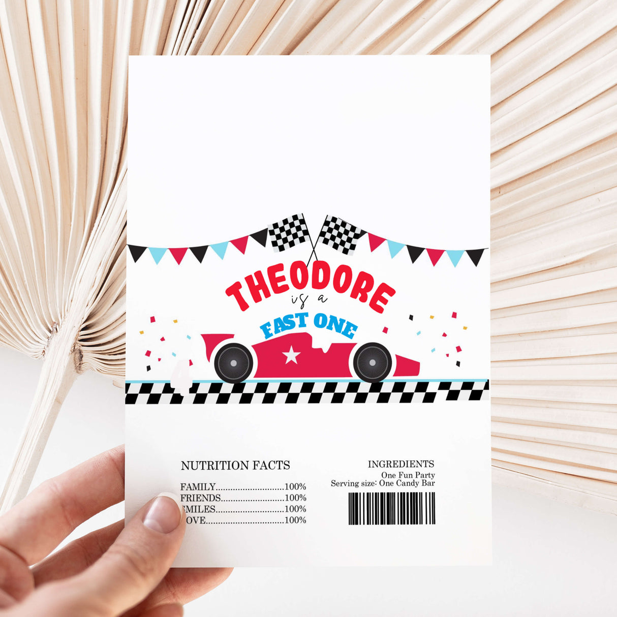 Race car birthday chocolate wrapper with checkered flags, blue car, and “Theodore is a fast one” text