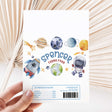 Space astronaut themed chocolate wrapper sheet with planets, rocket, and Spencer