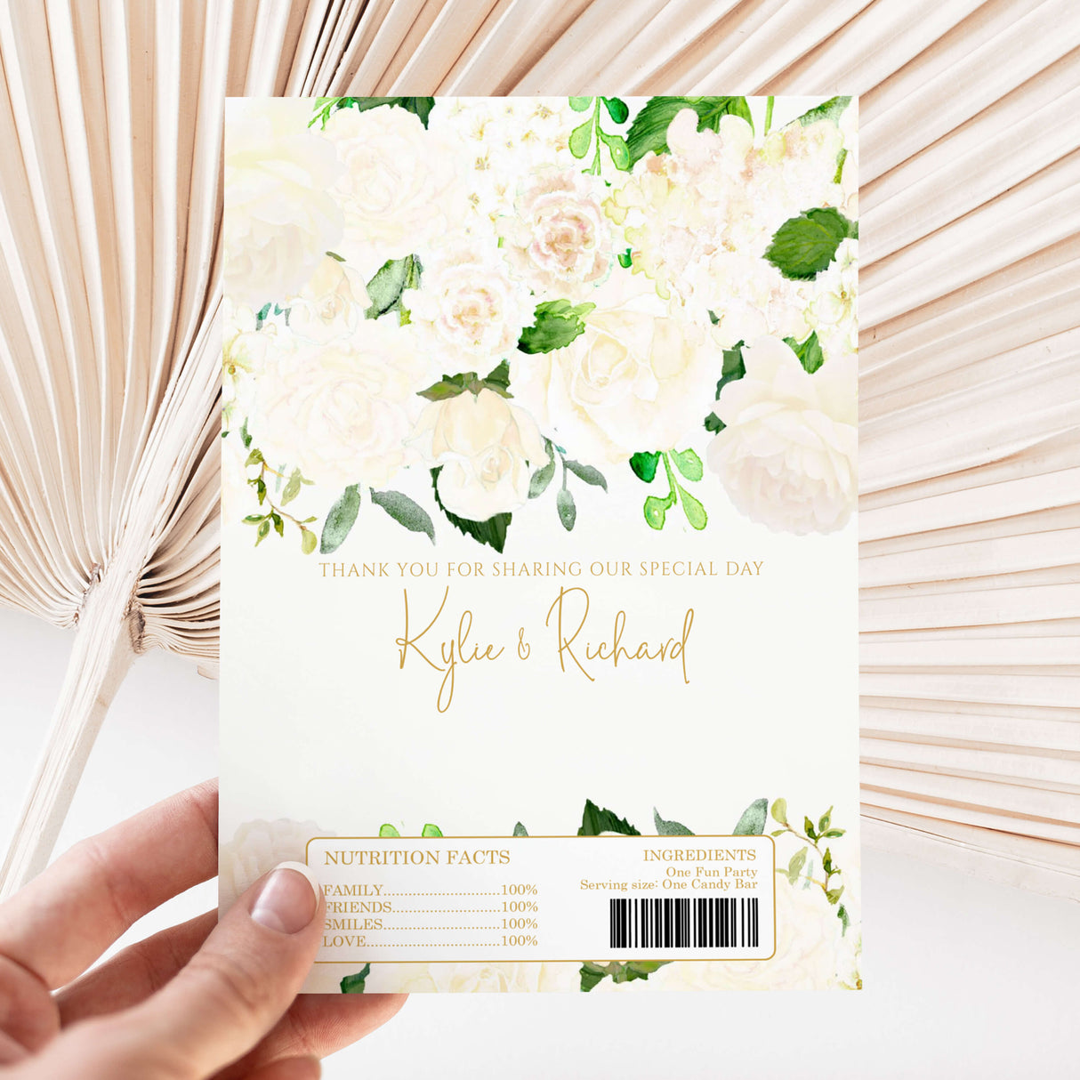 White wedding chocolate wrapper with green leaves, cream roses, thank-you text and names.